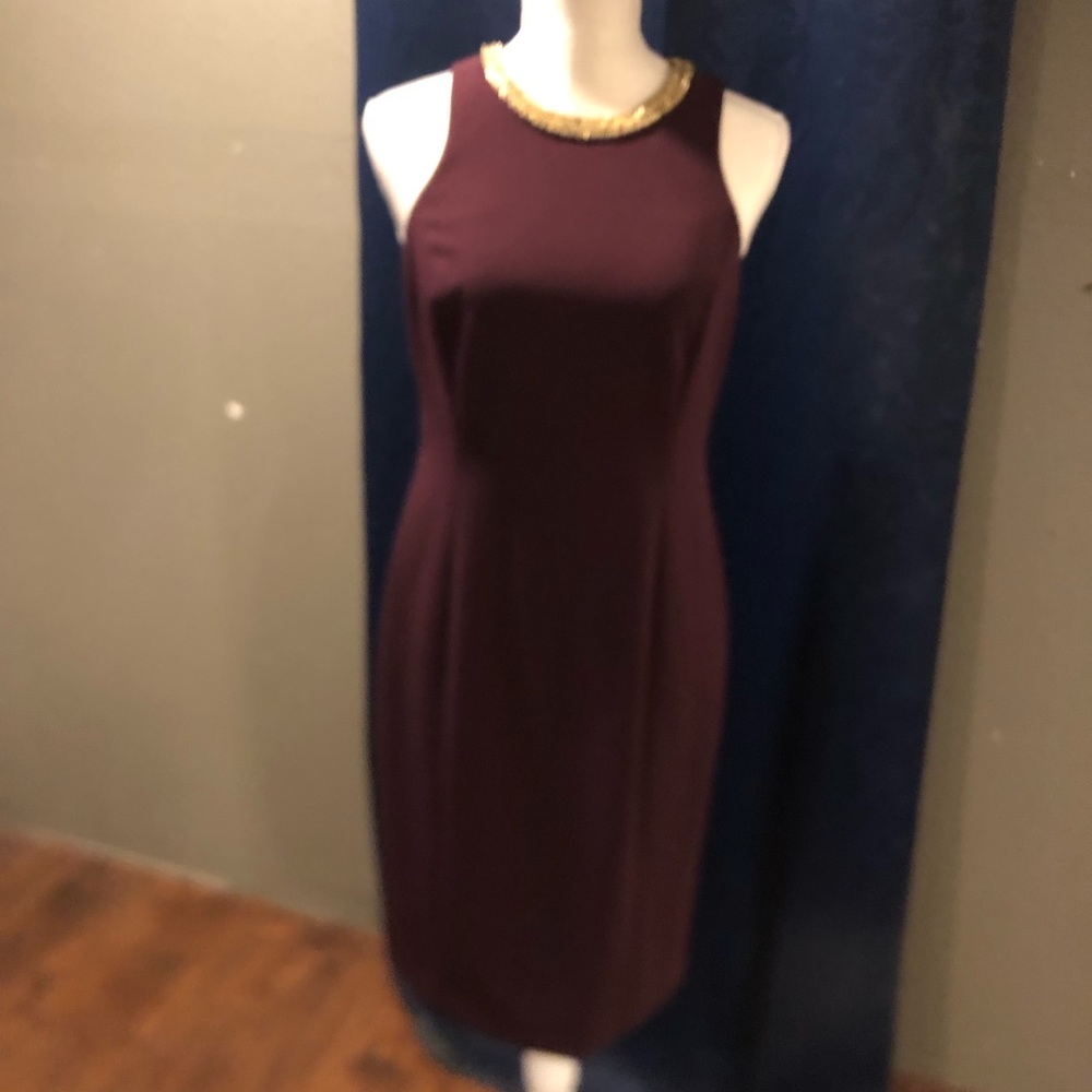 Calvin Klein Eggplant colored dress with gold neckline